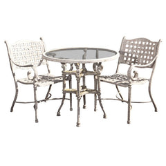 Cast Metal Table And Two Chairs