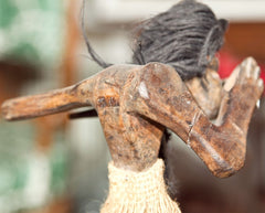 Two Tribal Wood Figures During Ceremony