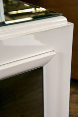 White Lacquered Credenza with Juxtaposing Mirrored Doors and Top